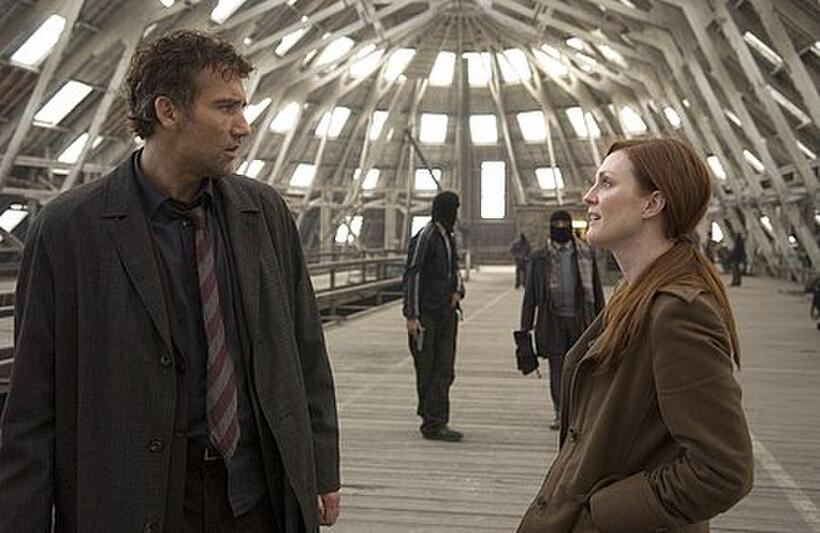 Theo (Clive Owen) and (Julianne Moore) in "Children of Men."