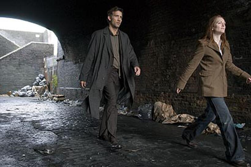 Clive Owen and Julianne Moore in "Children of Men."