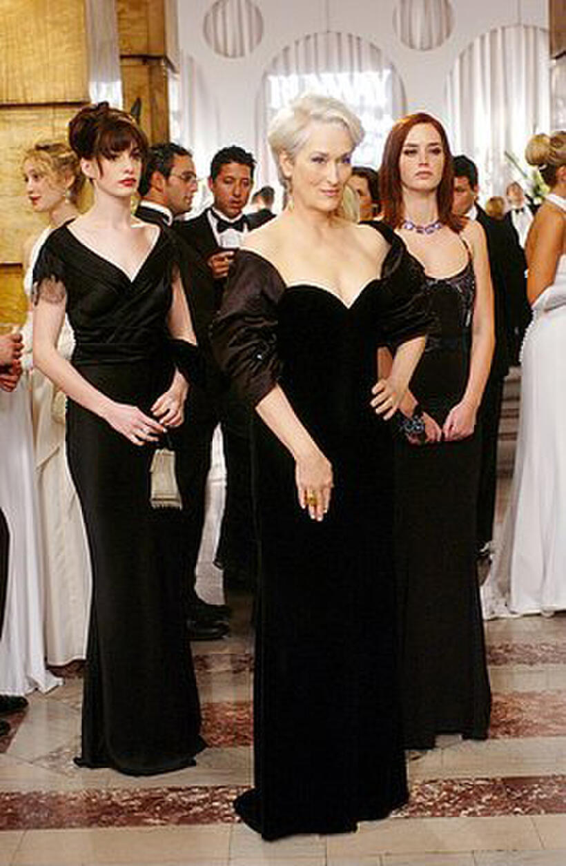 Miranda Priestly (Meryl Streep) is flanked by her two assistants, Andy (Anne Hathaway) and Emily (Emily Blunt) in "The Devil Wears Prada."
