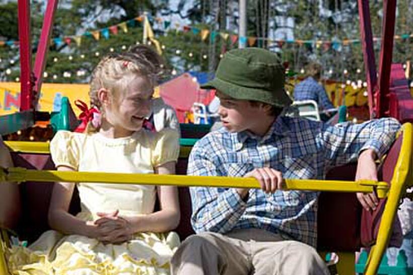 Fern (Dakota Fanning) and Henry Fussy (Julian O'Donnell) take a ride on the ferris wheel in "Charlotte's Web."