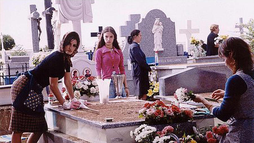 Penelope Cruz as Raimunda, Yohana Cobo as Paula, and Lola Duenas as Sole in "Volver."