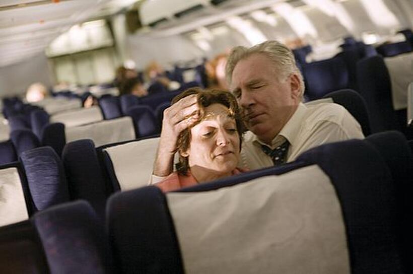 Becky London and Tom O'rourke as Jean and Donald Peterson comfort one another in "United 93."