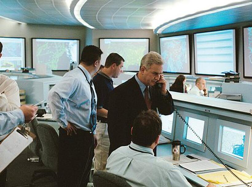FAA Herndon, VA operations manager Ben Sliney as himself, surrounded by air traffic controllers in "United 93."