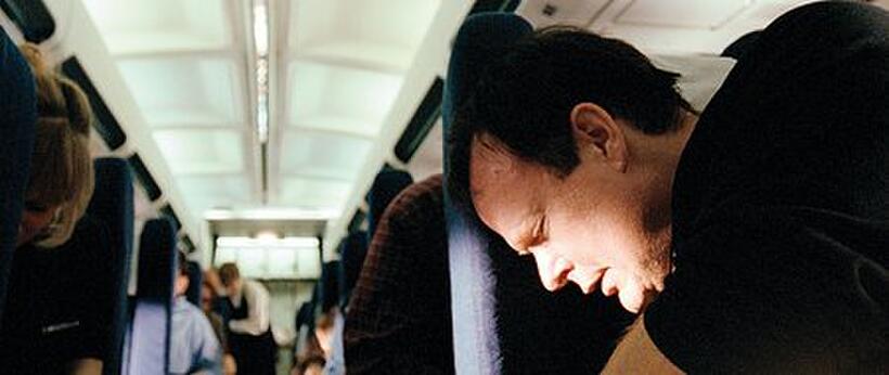 Christian Clemenson as Thomas E. Burnett, Jr. thinks of next steps to fight back against the plane's hijackers in "United 93."