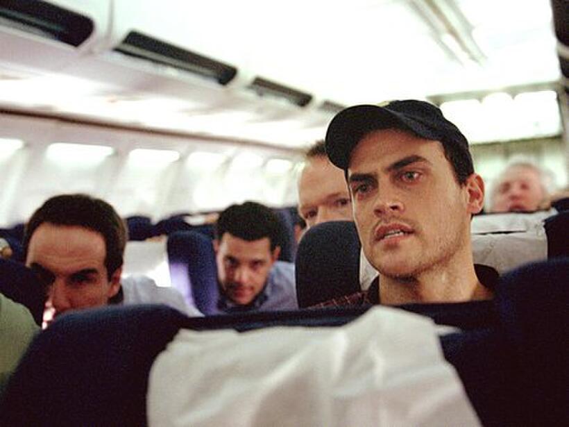 Cheyenne Jackson as Mark Bingham and other passengers prepare to fight back against their hijackers in "United 93."