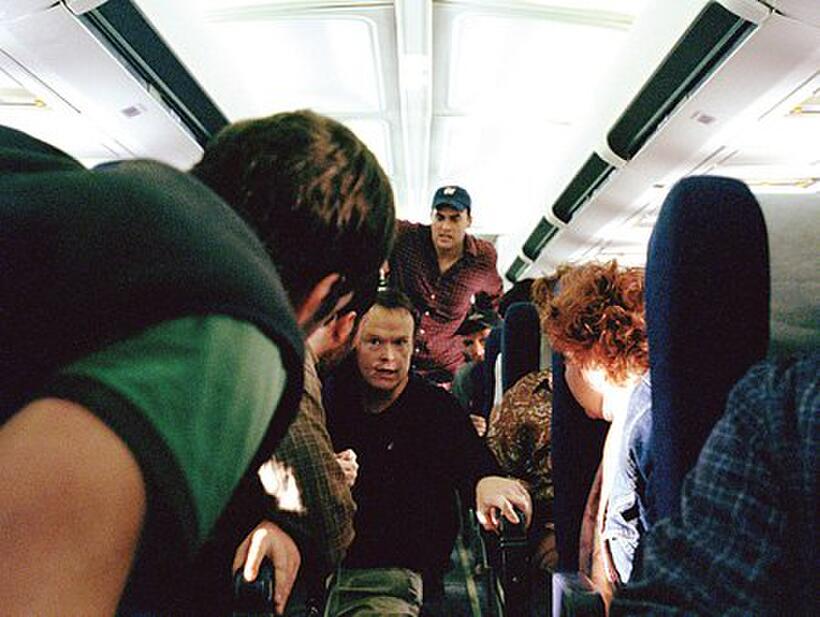 Passengers of United Airlines Flight 93 prepare their retaliation plan in "United 93." 
