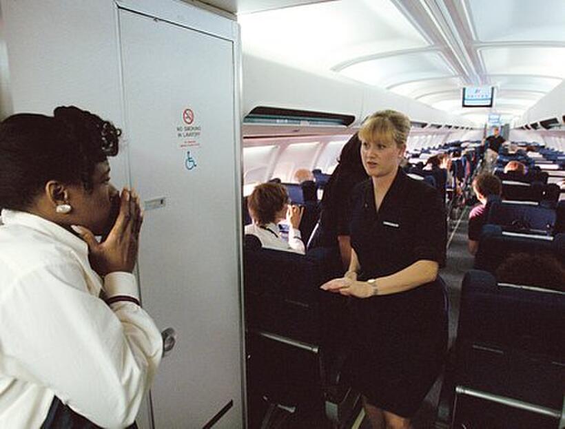 Starla Benford and Trish Gates as United Airlines Flight 93 flight attendants Wanda Green and Sandra Bradshaw discuss the hijacking in "United 93." 