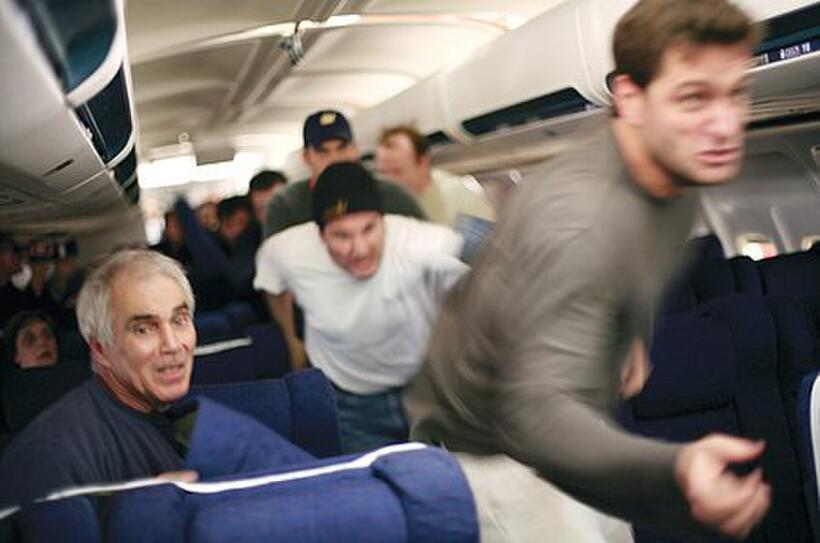 Crew and passengers of United Airlines Flight 93 charge to reclaim the plane from the hijackers in "United 93."