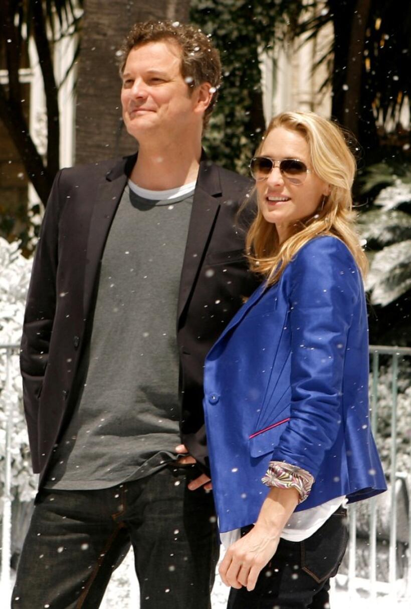 Colin Firth and Robin Wright Penn at the photocall of "Disney's A Christmas Carol" during the 62nd Annual Cannes Film Festival.