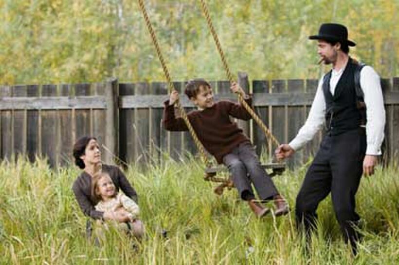 Mary-Louise Parker, Brooklynn Proulx, Dustin Bollinger and Brad Pitt in "The Assassination of Jesse James by the Coward Robert Ford."