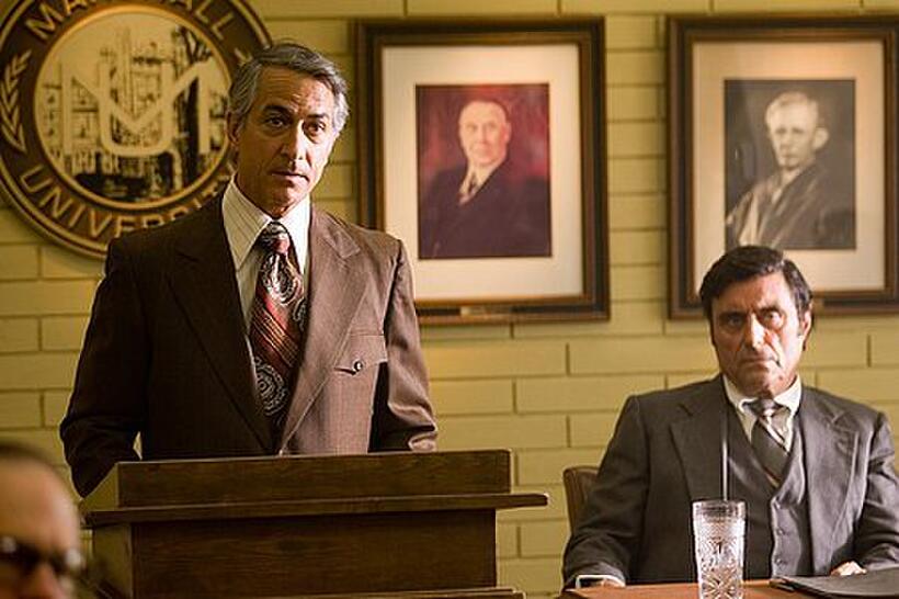 President Dedmon (David Strathairn) and University board member Paul Griffen (Ian McShane) in "We Are Marshall."