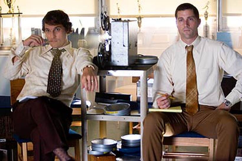 Matthew McConaughey and Matthew Fox study game film in "We Are Marshall."
