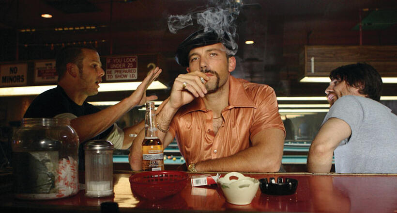 Bounty hunters "Pistol" Pete Deeks (Peter Berg), Jack Dupree (Ben Affleck) and Hollis Elmore (Martin Henderson) discuss their quarry in "Smokin' Aces."