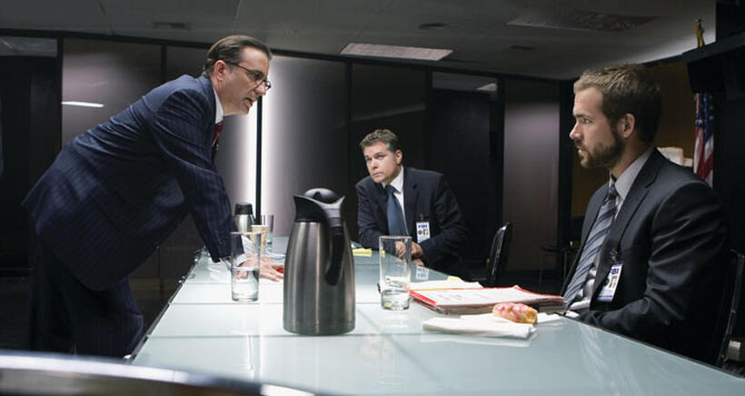 FBI Deputy Director Stanley Locke (Andy Garcia), Agent Donald Carruthers (Ray Liotta) and Agent Richard Messner (Ryan Reynolds) discuss next steps in "Smokin' Aces."