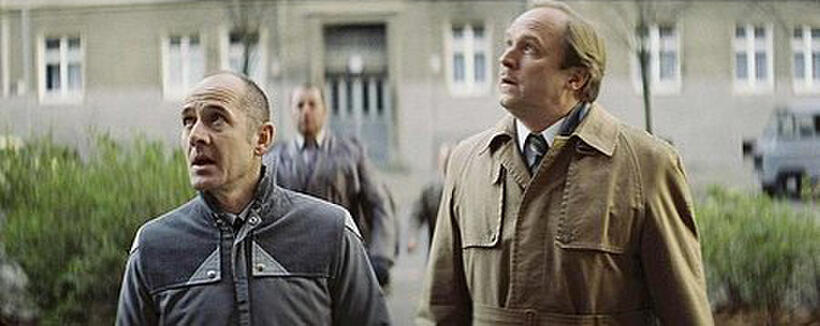 Ulrich Muhe as Captain Gerd Wiesler and Ulrich Tukur as Lietenant Colonel Grubitz in "The Lives of Others."