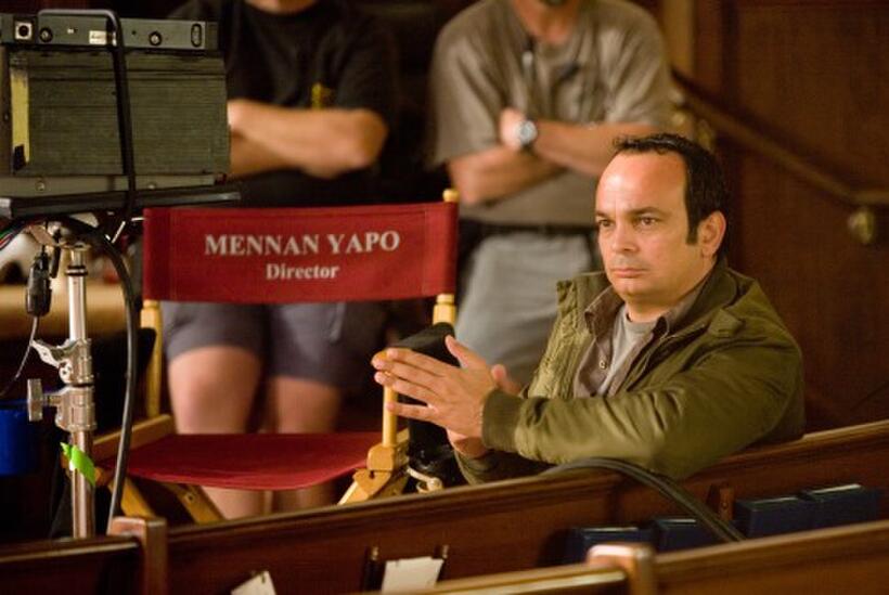Director Mennan Yapo on the set of "Premonition."