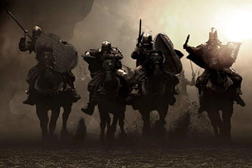 Black Persian battle stallions and their riders emerge from the dusty horizon and thunder down upon the Spartan line in "300."