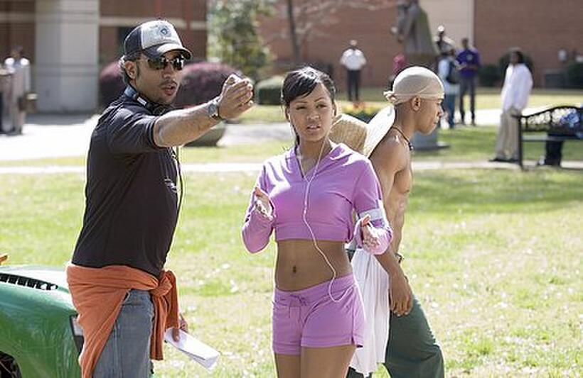 Director Sylvain White with Meagan Good and Columbus Short on the set of "Stomp the Yard."