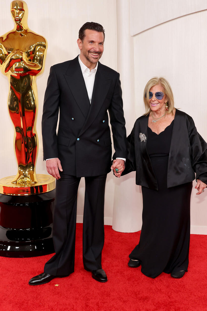 
	Bradly Cooper and Gina Campano
