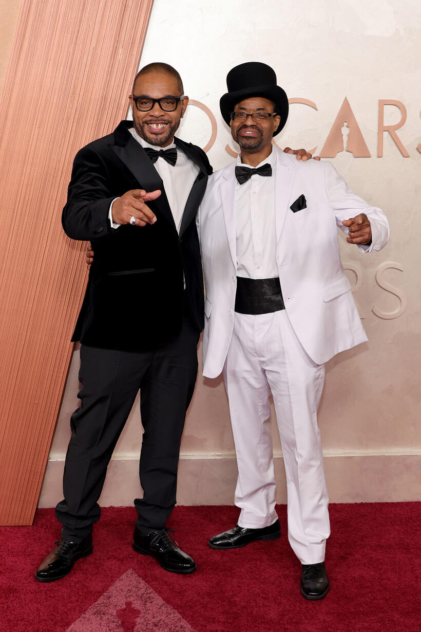 
	Clarence Maclin and Divine G
