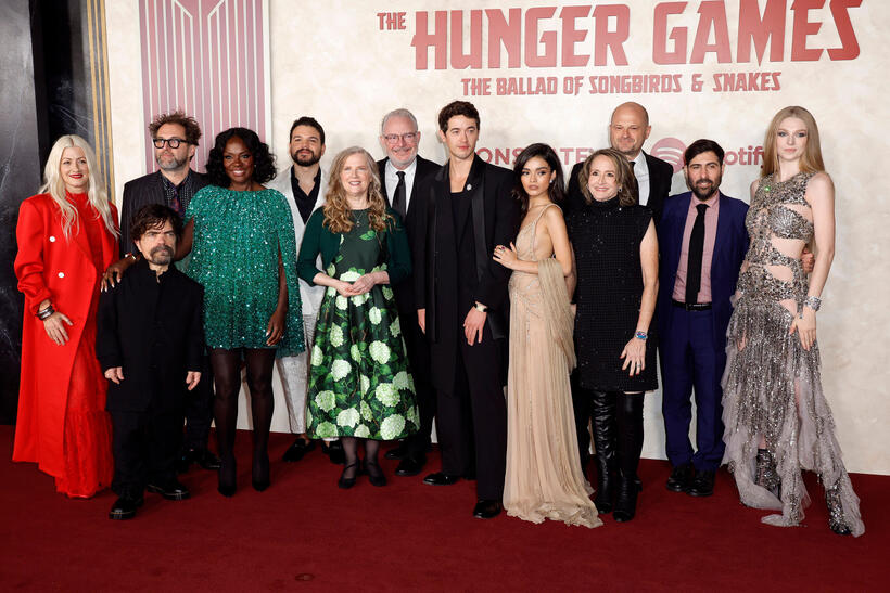 
	Costume designer Trish Summerville, Peter Dinklage, production designer Uli Hanisch, Viola Davis, Josh Andr&eacute;s Rivera, Suzanne Collins, Francis Lawrence, Tom Blyth, Rachel Zegler, producer Nina Jacobson, producer Brad Simpson, Jason Schwartzman and Hunter Schafer
