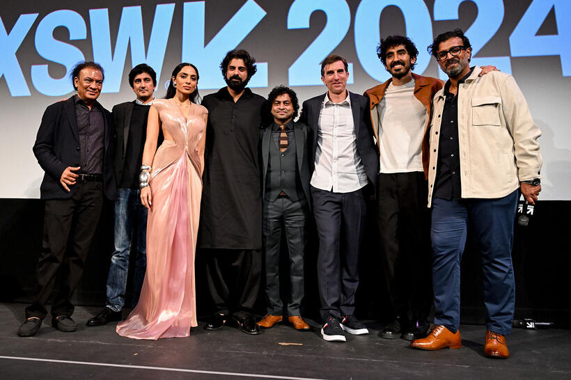 
	Vipin Sharma, Sobhita Dhulipala, Sikandar Kher, Pitobash Tripathy, Sharlto Copley, Dev Patel and Jomon Thomas
