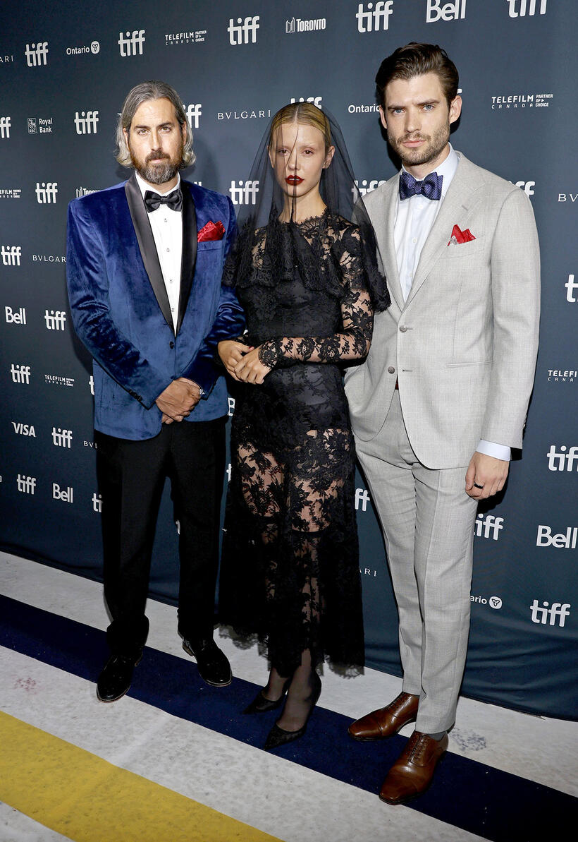 
	Ti West, Mia Goth and David Corenswet
