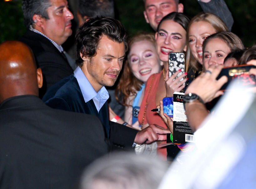 
	Harry Styles and fans
