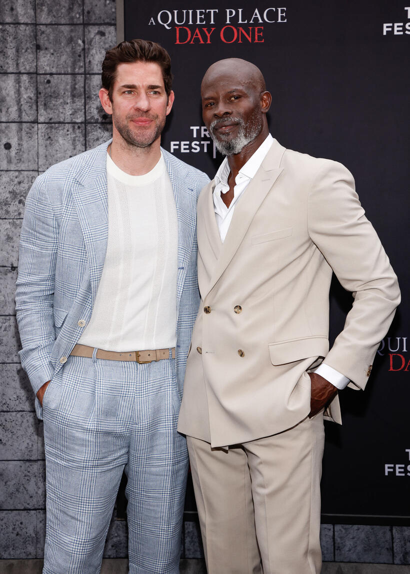
	John Krasinski and Djimon Hounsou
