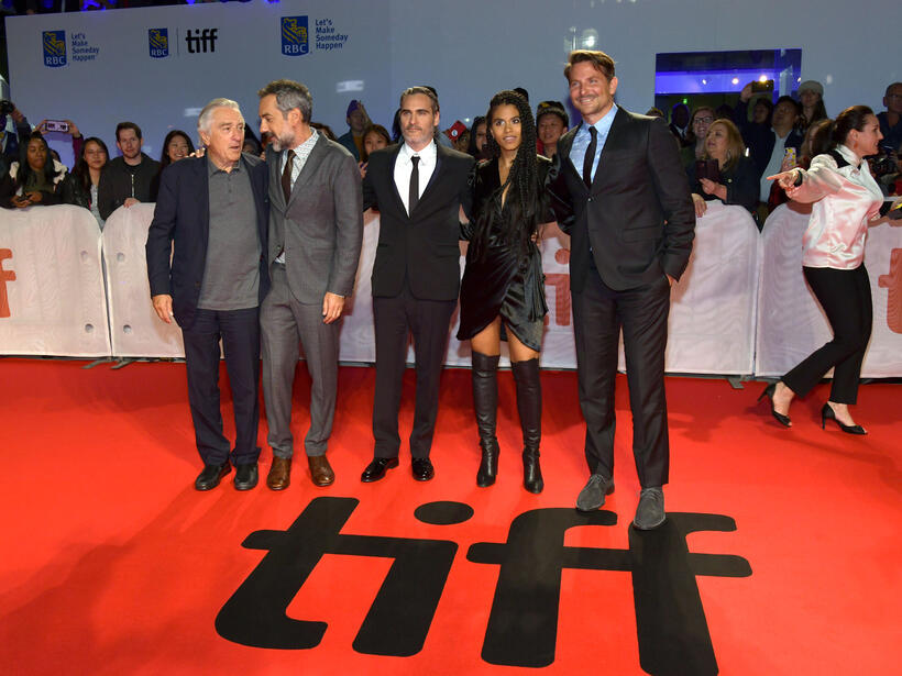
	Robert De Niro, Todd Phillips, Joaquin Phoenix, Zazie Beetz and Bradley Cooper
