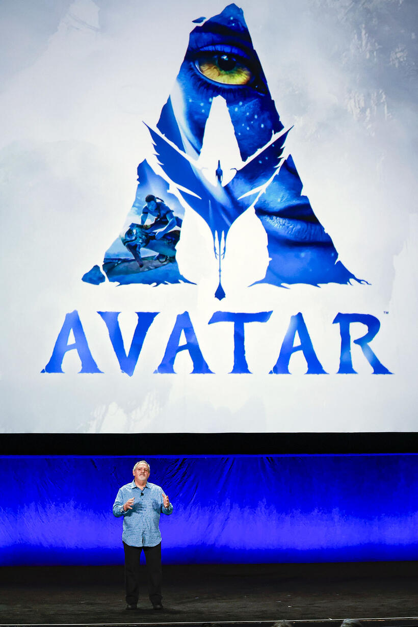 
	Jon Landau in front of Avatar logo
