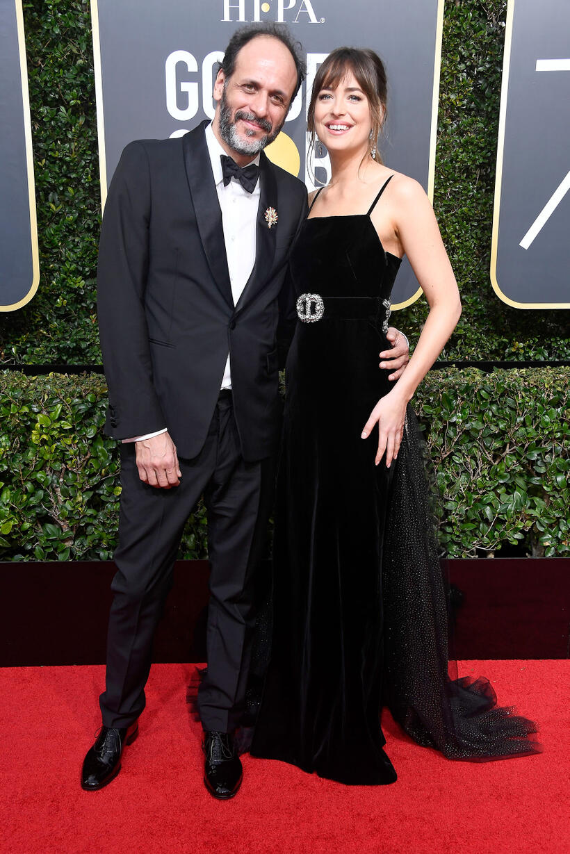 
	Luca Guadagnino and Dakota Johnson
