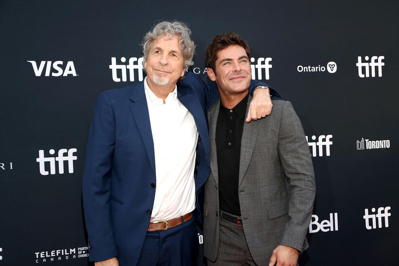 
	Peter Farrelly and Zac Efron
