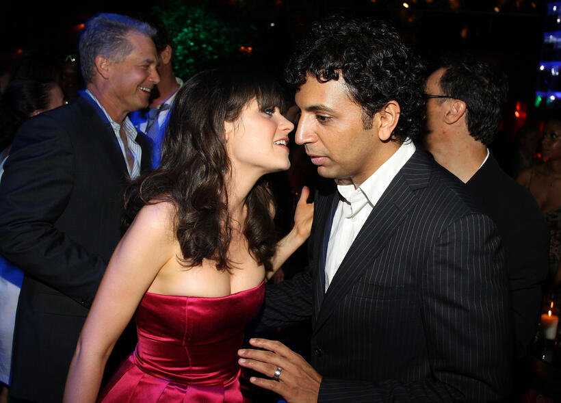 Zooey Deschanel and M. Night Shyamalan 