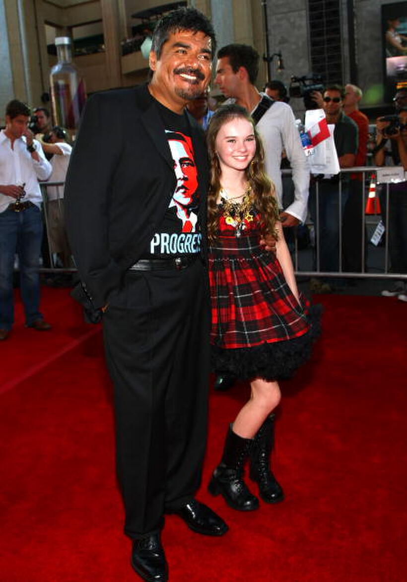 George Lopez and Madeline Carroll at the world premiere of "Swing Vote."