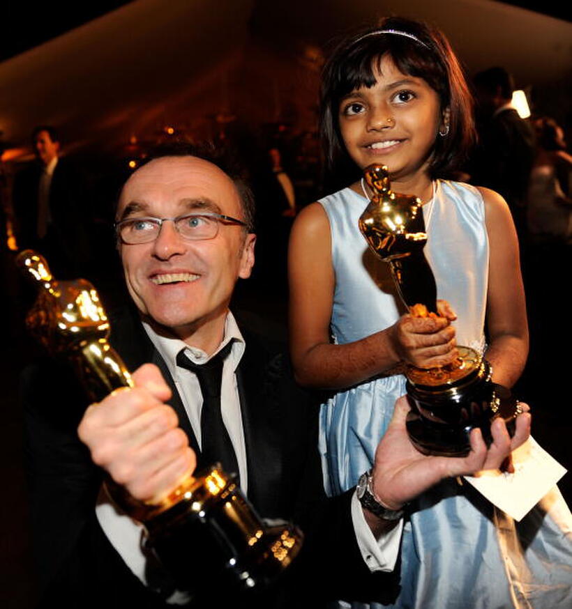 Director Danny Boyle and Rubina Ali at the 81st Annual Academy Awards.