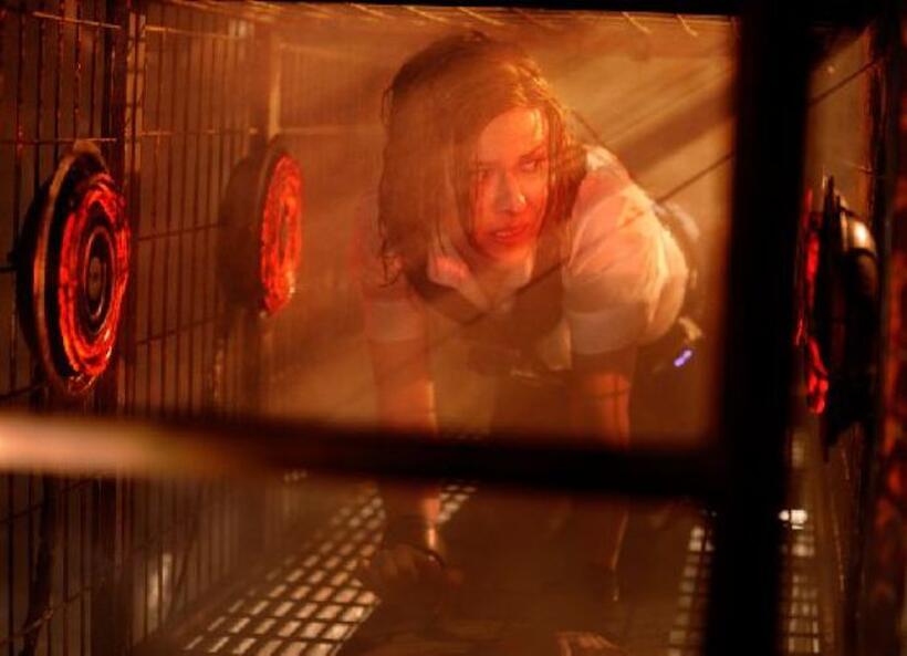 Caroline Cave as Debbie in "Saw VI."