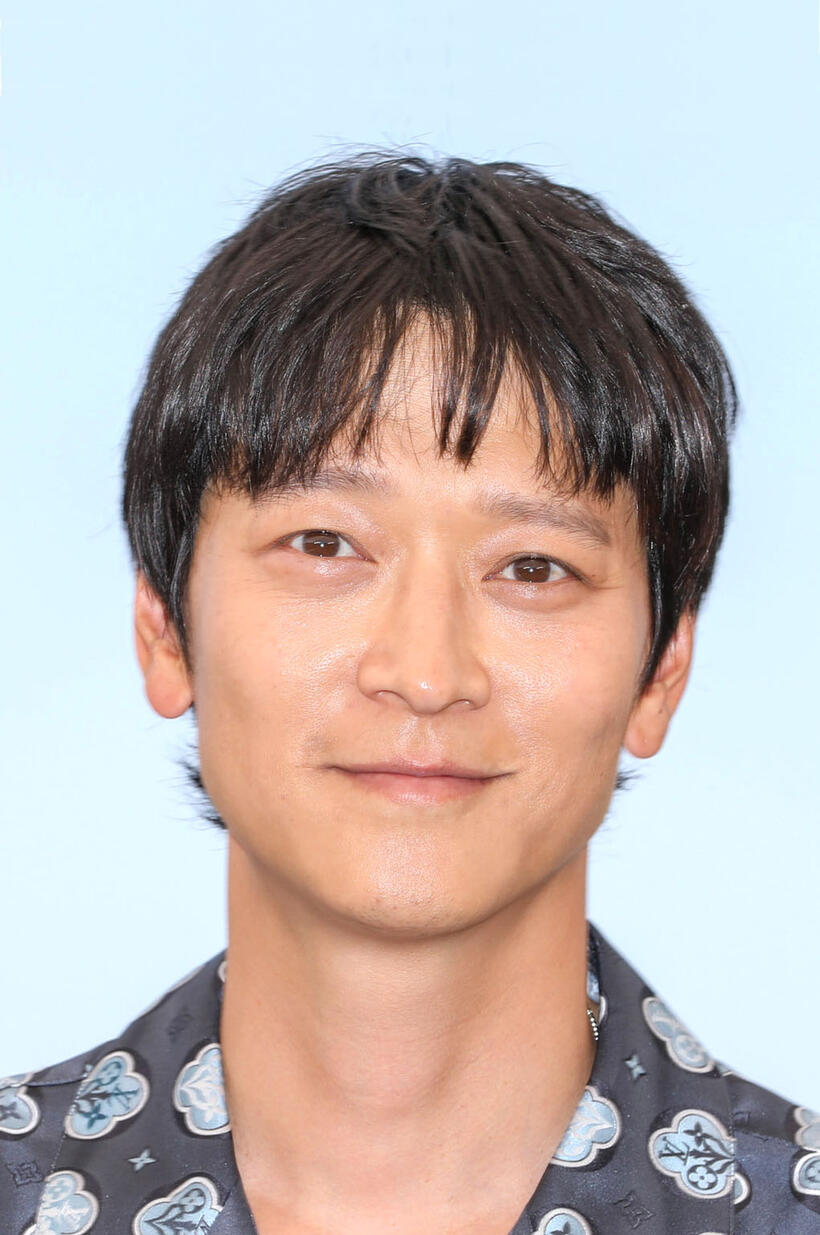 Gang Dong-won at the photocall for "Broker" during the 75th annual Cannes Film Festival.