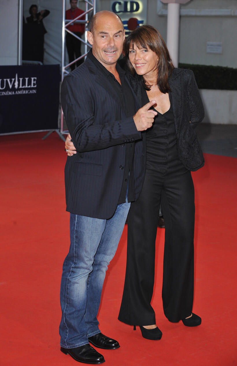 Bernard Campan and guest at the premiere "The Kids Are Allright" during the 36th Deauville American Film Festival.