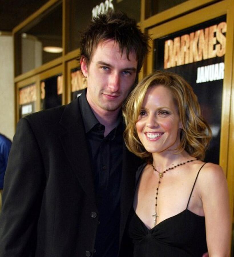 Gannon Russo and Emma Caulfield at the premiere of "Darkness Falls."