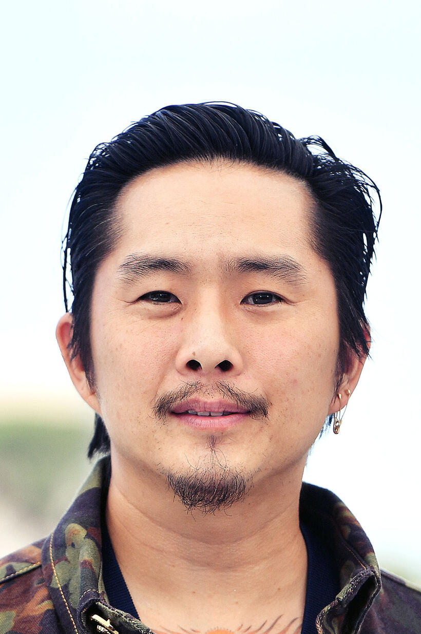 Justin Chon at the "Blue Bayou" photocall during the 74th annual Cannes Film Festival.
