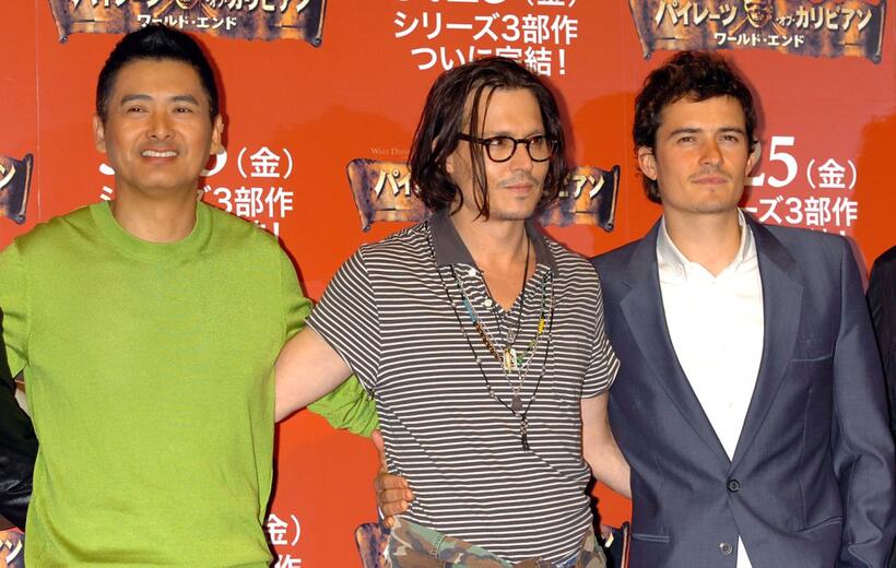 Chow Yun-Fat, Johnny Depp and Orlando Bloom at Tokyo the photocall to promote "Pirates Of The Caribbean: At World's End".