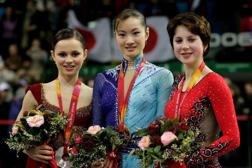 Sasha Cohen, Shizuka Arakawa and Irina Slutskaya at the women's Free Skating program of figure skating during the Turin 2006 Winter Olympic Games.