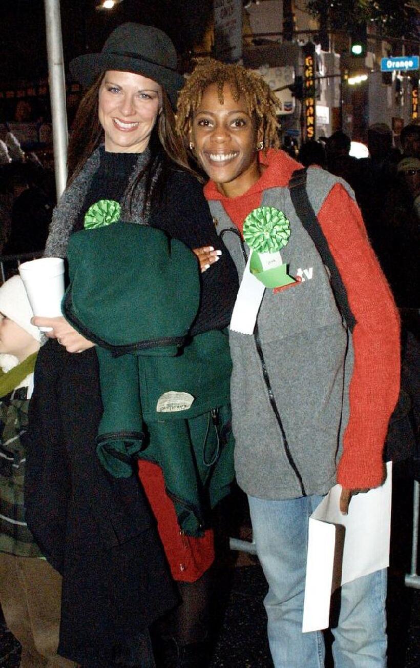 Mo Collins and Debra Wilson at the 70th Anniversary Hollywood Christmas Parade.
