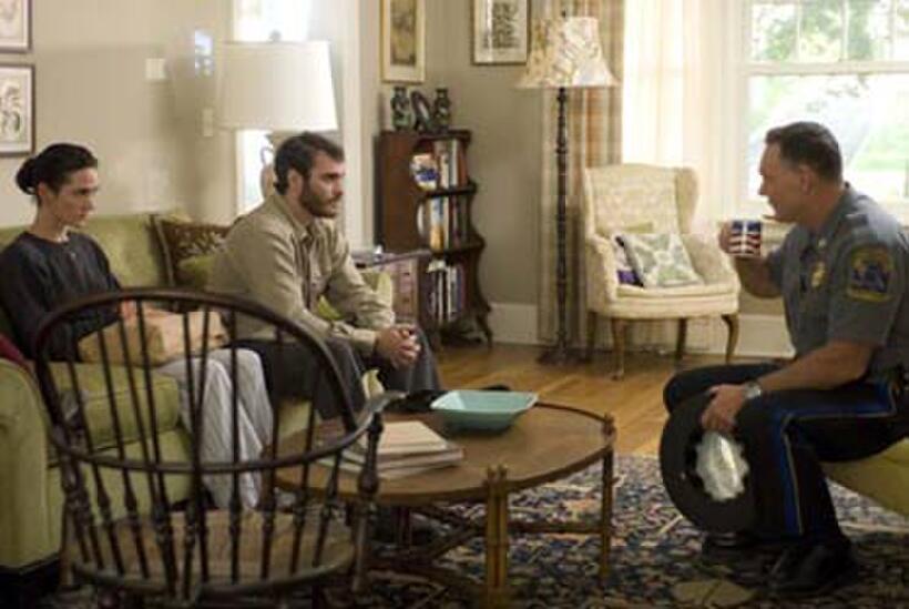 Jennifer Connelly, Joaquin Phoenix and Antoni Corone in "Reservation Road."