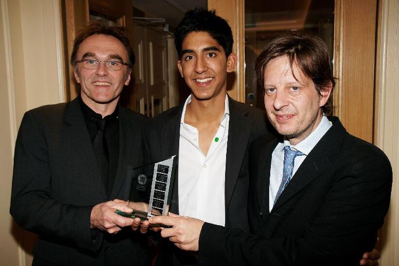 Danny Boyle, Dev Patel and Christian Colson at the winners room during the London Critics' Circle Film Awards.