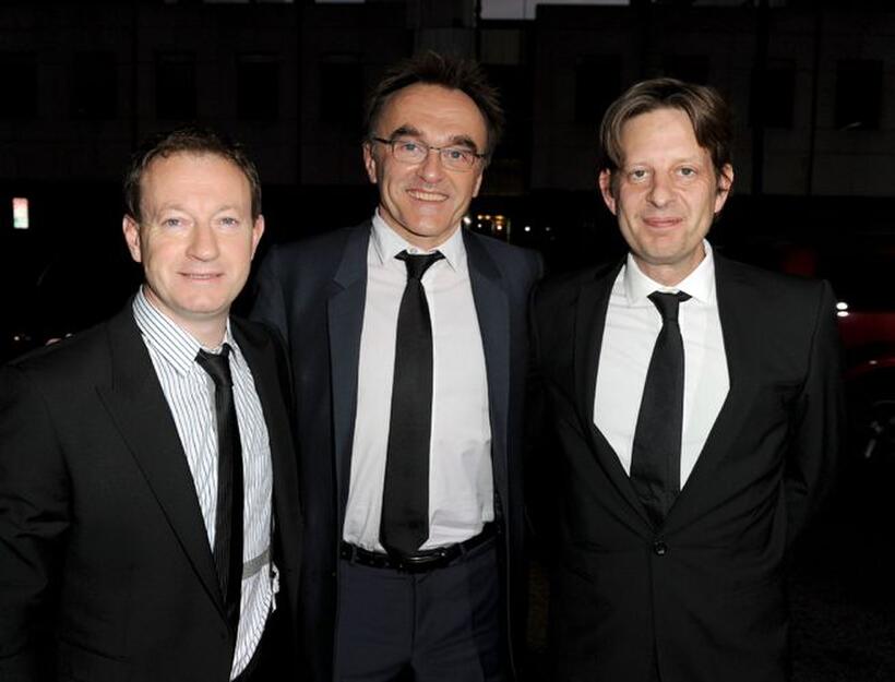Writer Simon Beaufoy, writer/director/producer Danny Boyle and Christian Colson at the premiere of "127 Hours."