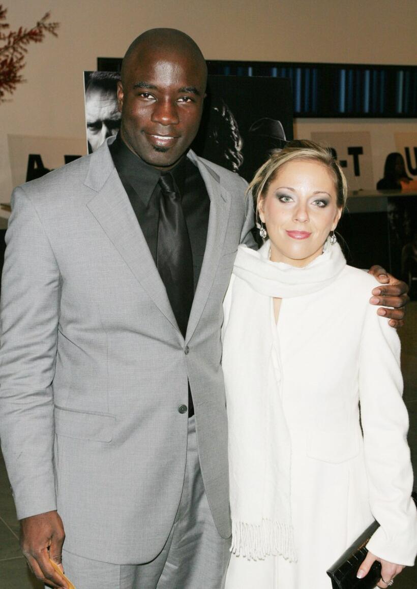 Mike Colter and Guest at the special screening of "Million Dollar Baby."