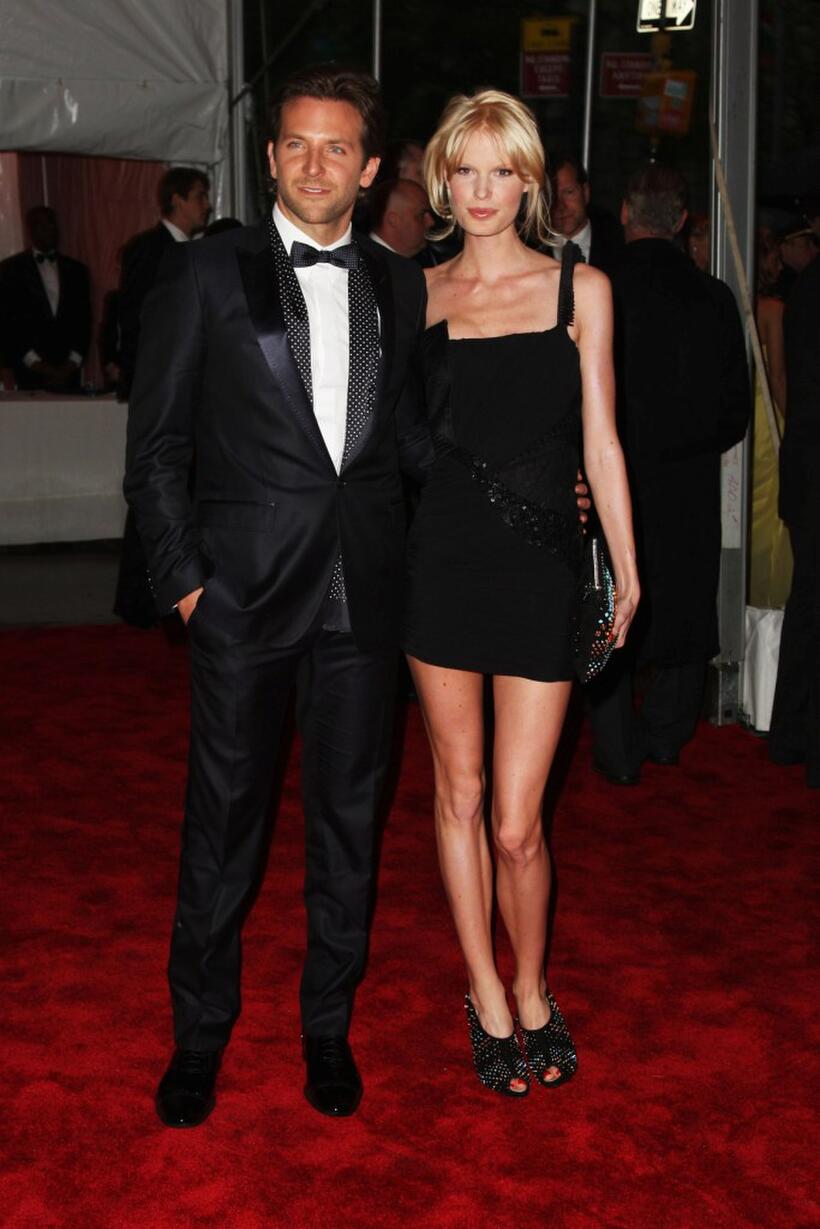 Bradley Cooper and Guest at the "Model as Muse: Embodying Fashion" Costume Institute Gala.