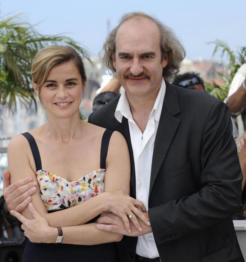 Anne Consigny and Michel Vuillermoz at the photocall of "Les Herbes Folles" during the 62nd International Cannes Film Festival.